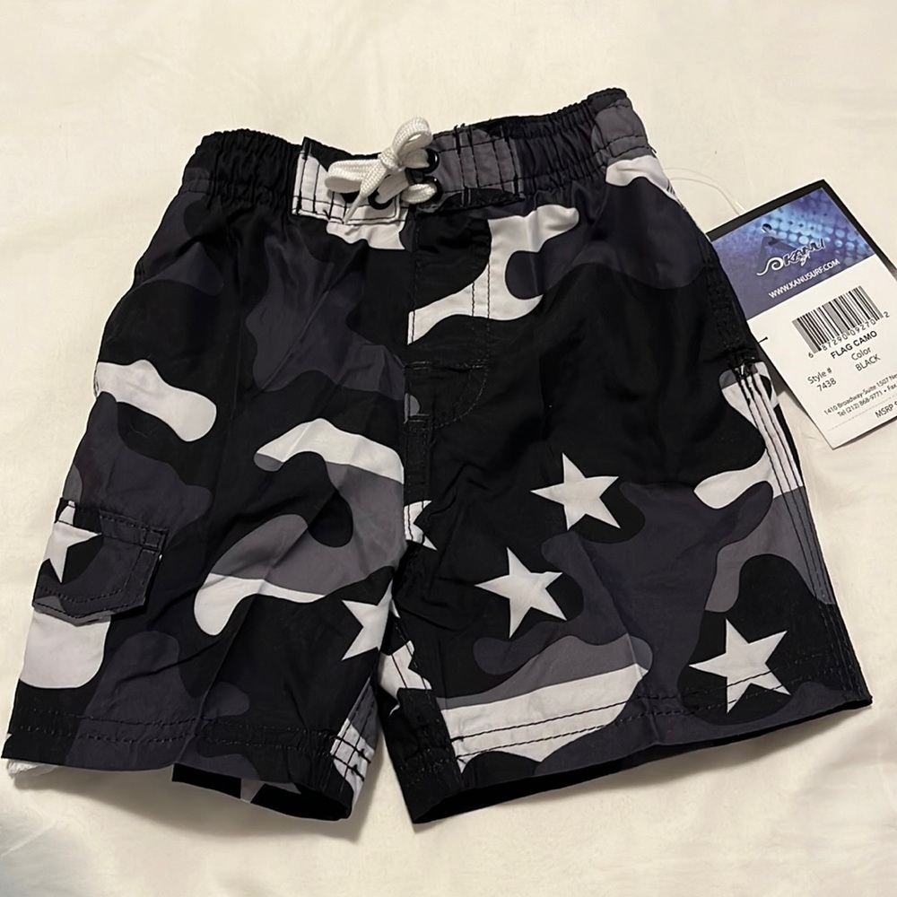 Kanu Surf black flag camo swim trunks